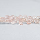 5 - 8mm Rose Quartz Faceted Hearts 9.5 inch 58 beads - The Bead Traders