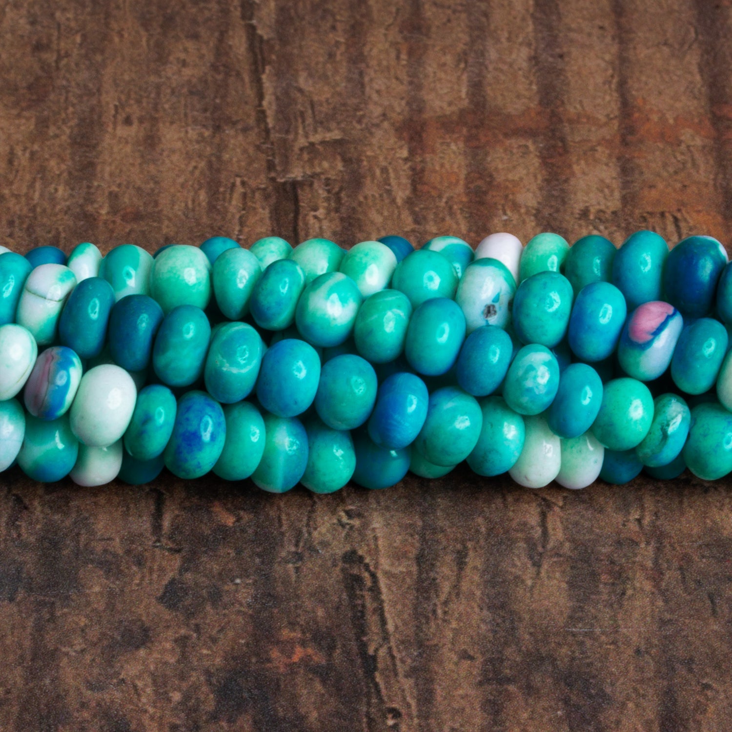 5.5 - 7mm Teal Opal Plain Rondelles 16 inch 90 beads - The Bead Traders