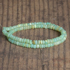 5.5mm Light Sea Green Opal Plain Rondelles 16 inch 125 beads - The Bead Traders