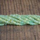5.5mm Light Sea Green Opal Plain Rondelles 16 inch 125 beads - The Bead Traders