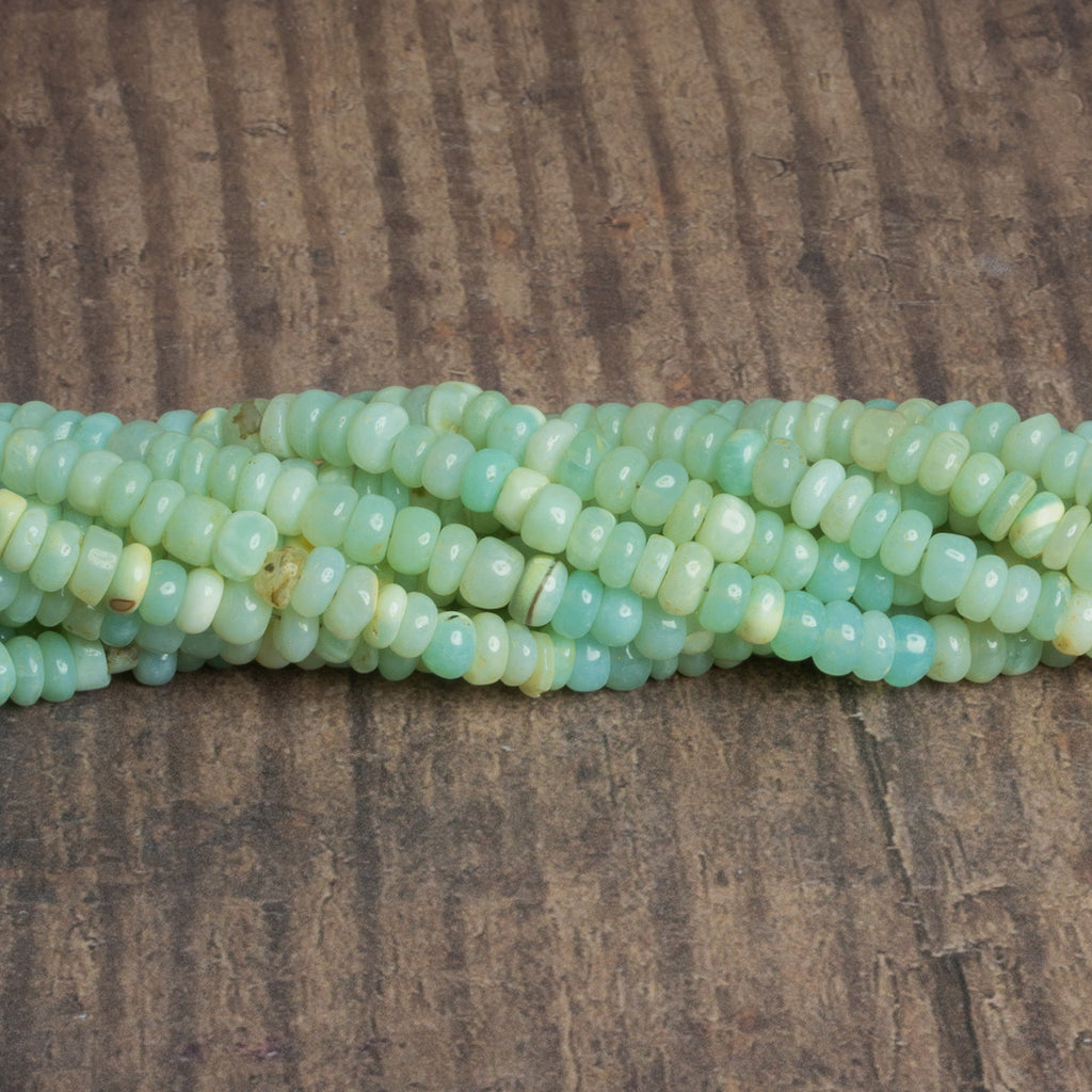 5.5mm Light Sea Green Opal Plain Rondelles 16 inch 125 beads - The Bead Traders