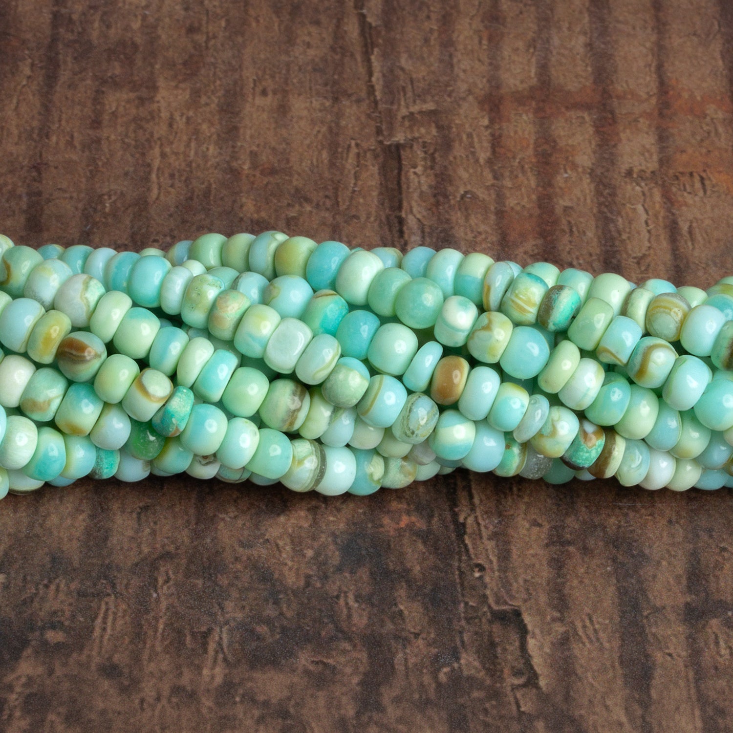 5mm Bue Opal Plain Rondelles 16 inch 110 beads - The Bead Traders