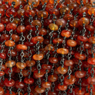5mm Carnelian Rondelle Black Gold Chain 34 beads - The Bead Traders