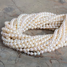 5mm Cream Petite Ringed Baroque Pearls 15 inch 75 beads - The Bead Traders
