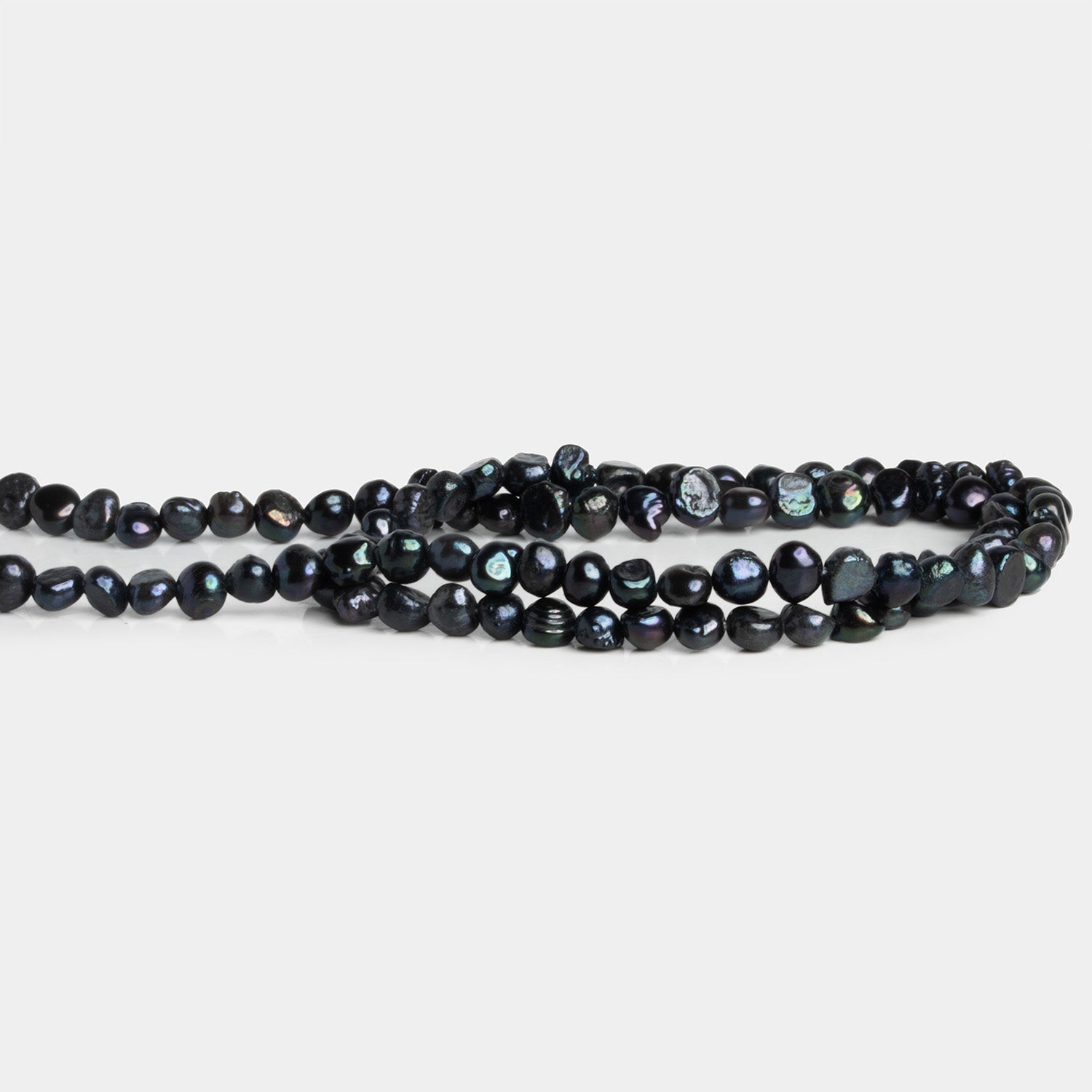 5mm Midnight Peacock Baroque Pearls 15 inch 93 beads - The Bead Traders