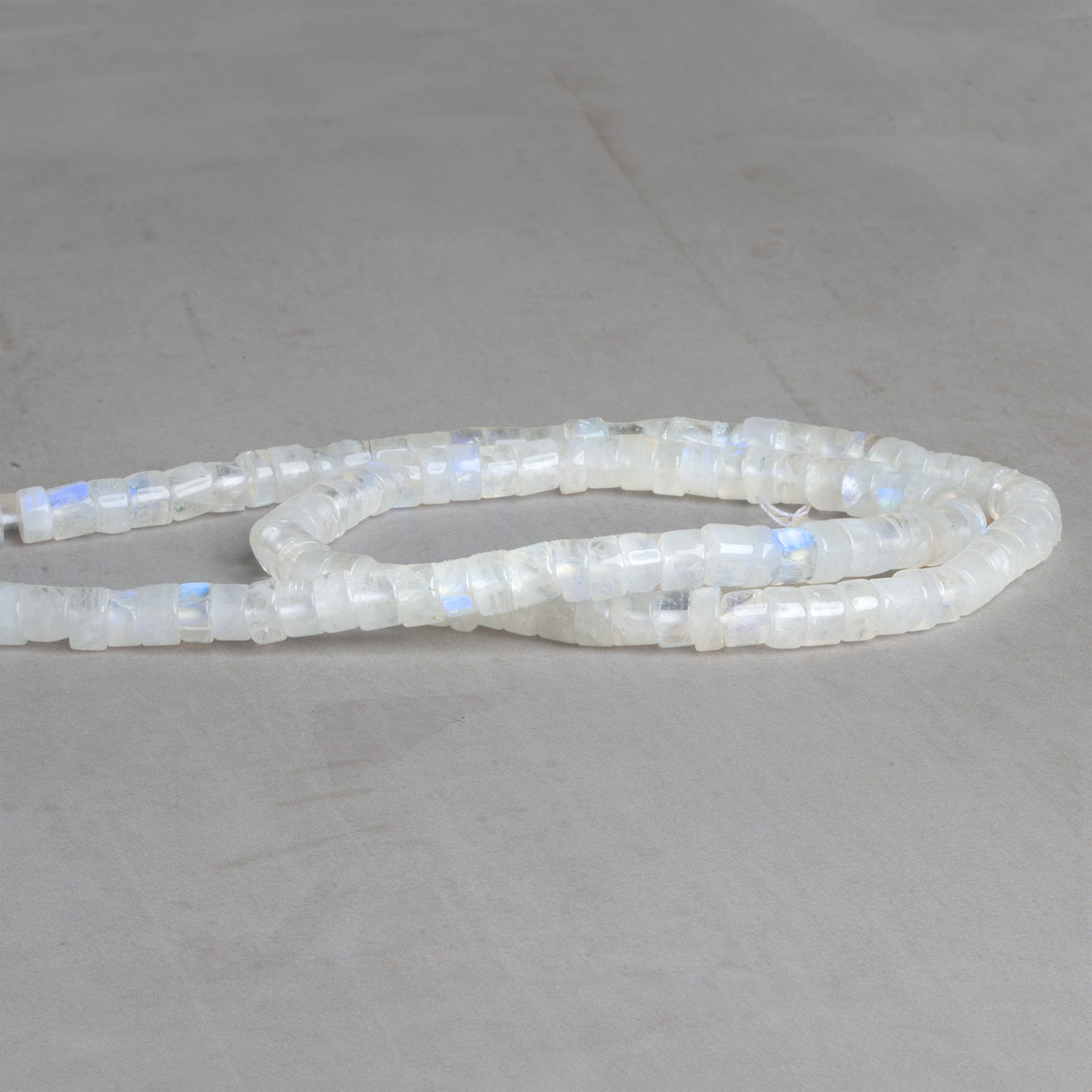 5mm Rainbow Moonstone Plain Heishis 14 inch 95 beads - The Bead Traders