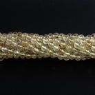 5mm Rutilated Quartz Plain Rounds 12 inch 60 beads - The Bead Traders