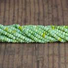 5mm Spring Green Opal Plain Rondelles 16 inch 140 beads - The Bead Traders
