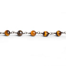5mm Tiger's Eye Plain Round Black Gold Chain 27 beads - The Bead Traders