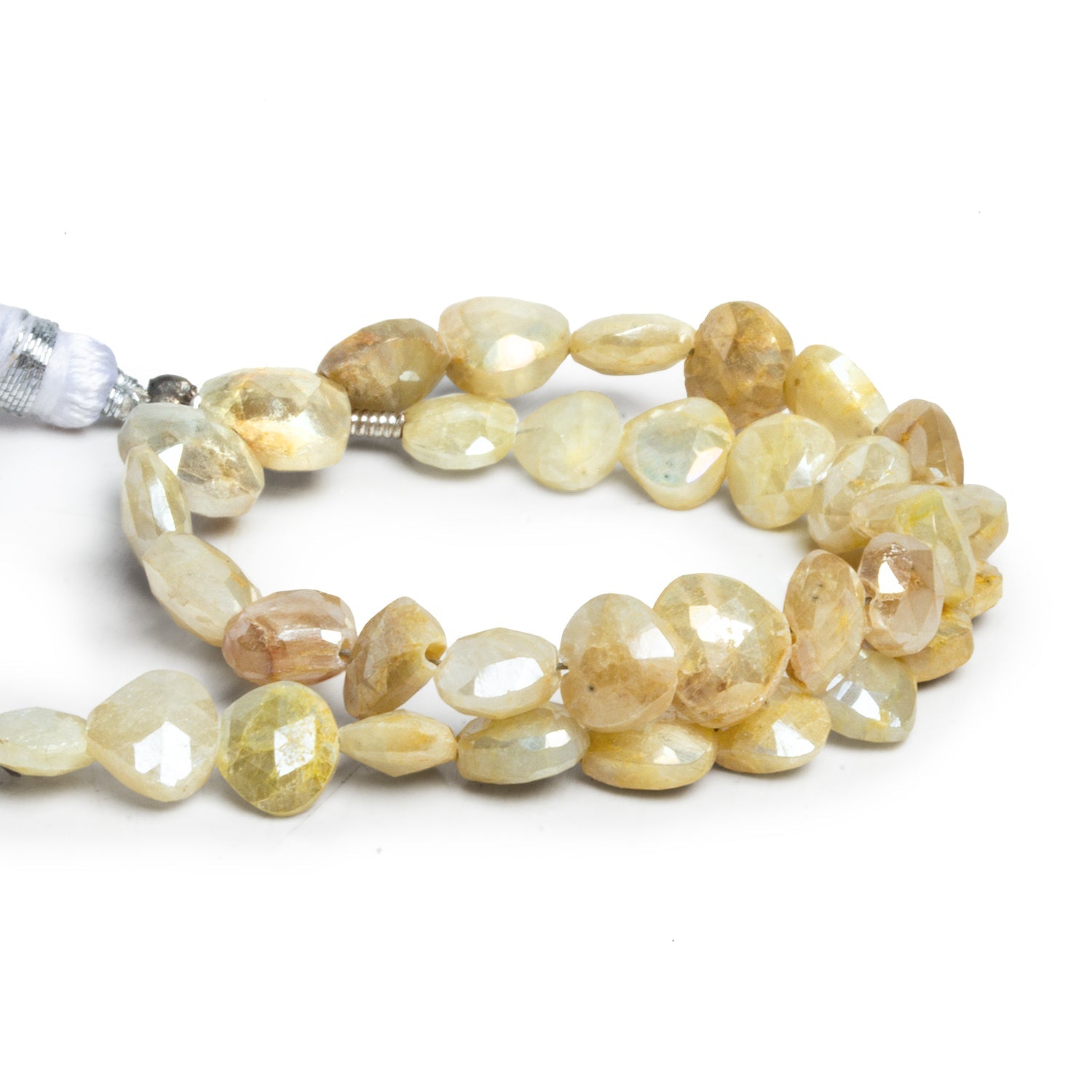 5mm to 7mm Mystic Sapphire Faceted Hearts 7.5 inch 35 beads - The Bead Traders