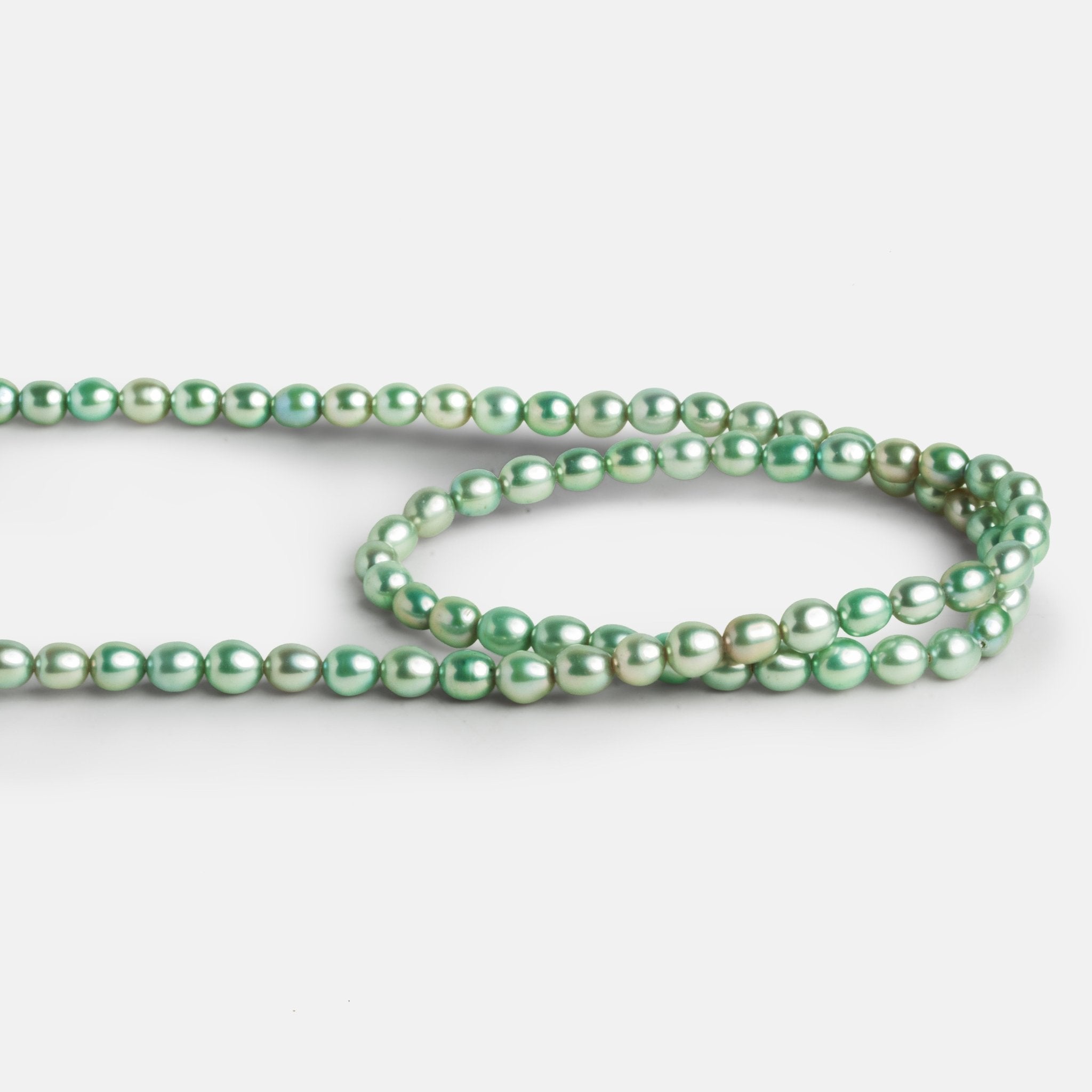 5x4.5mm Mint Oval Pearls 15 inch 73 beads - The Bead Traders