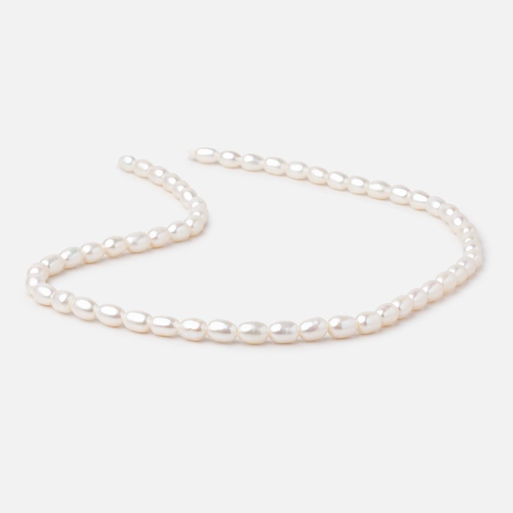 5x7mm Cream Large Hole Oval Freshwater Pearls 16 inch 52 pieces - The Bead Traders