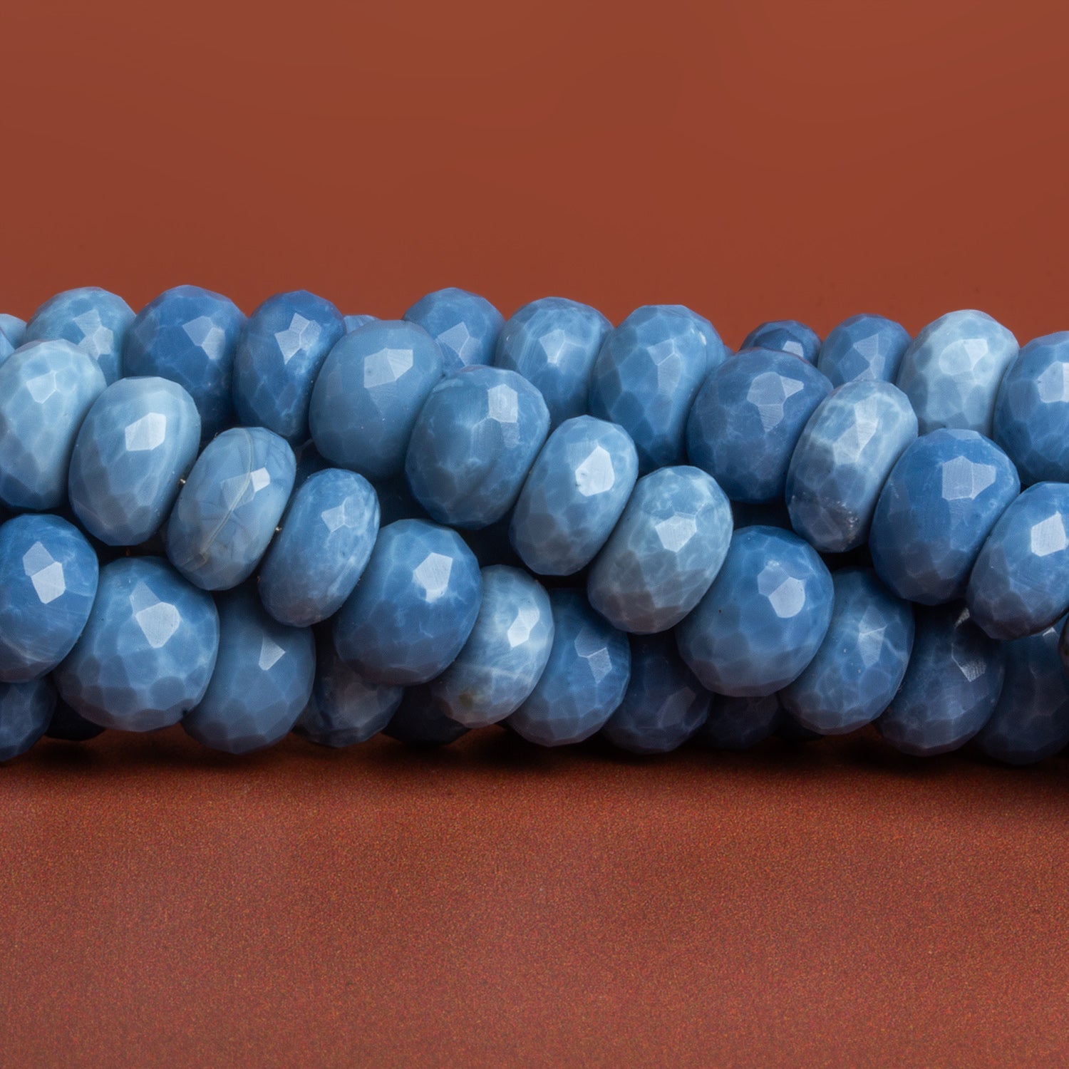 6 - 10mm Denim Opal Faceted Rondelles 16 inch 75 beads - The Bead Traders