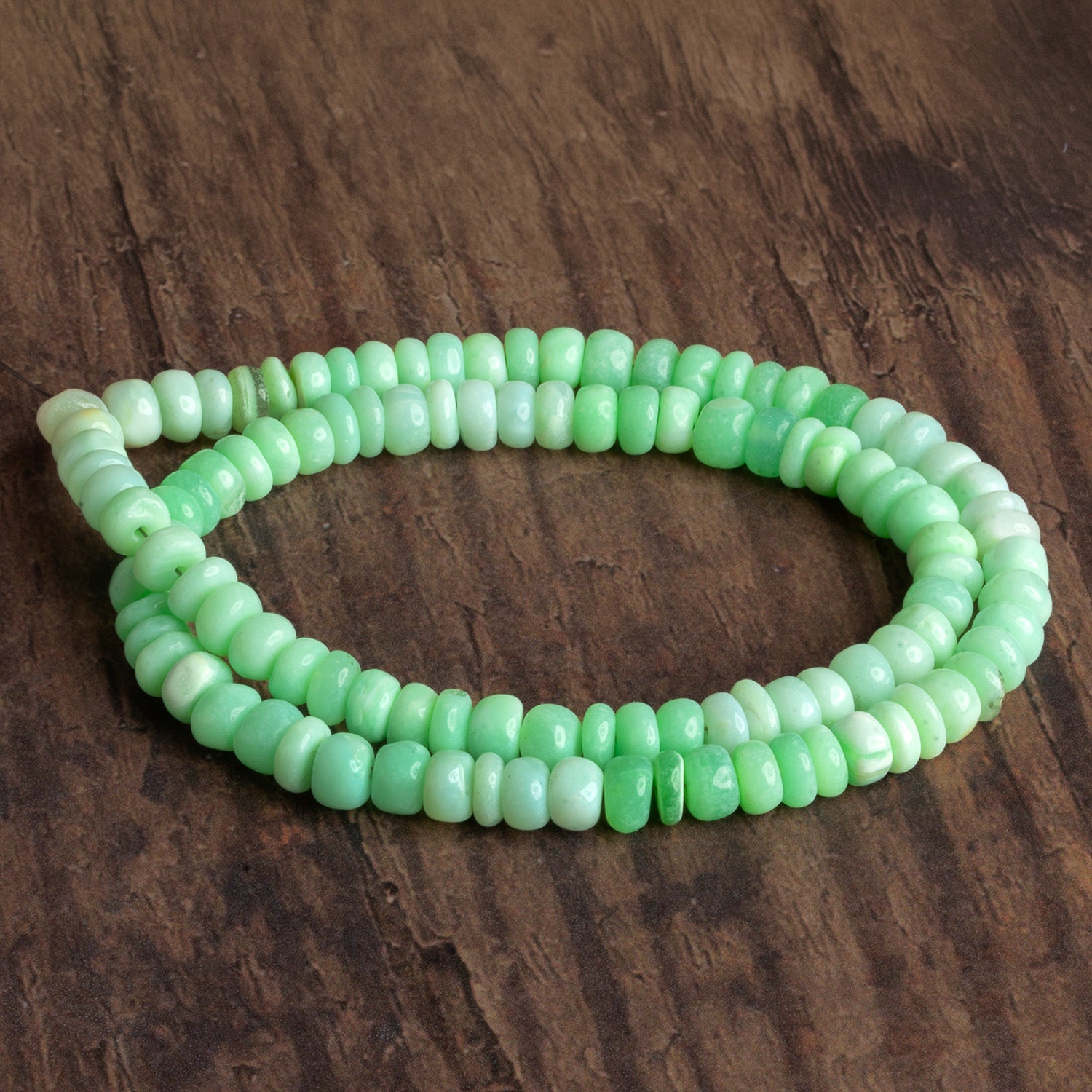 6 - 6.5mm Mint Green Opal Plain Rondelles 16 inch 105 beads - The Bead Traders