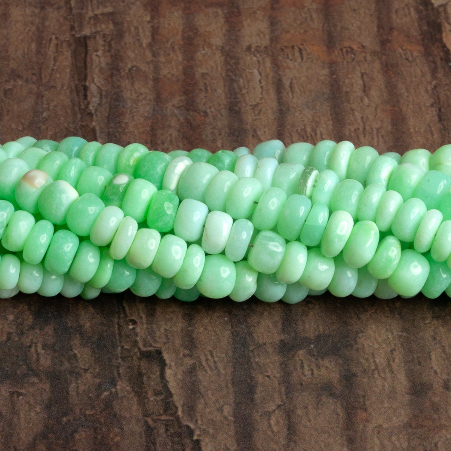 6 - 6.5mm Mint Green Opal Plain Rondelles 16 inch 105 beads - The Bead Traders