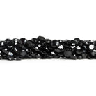 6 - 7mm Black Spinel Faceted Coins 12 inch 55 beads - The Bead Traders
