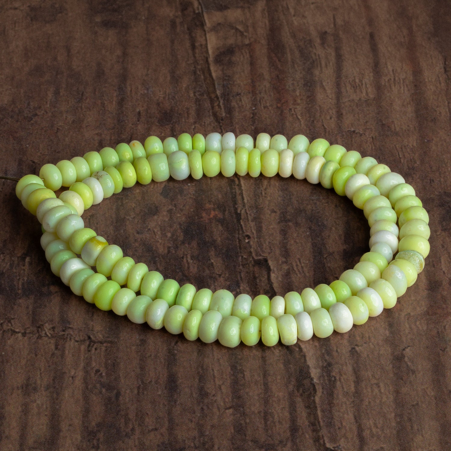 6 - 7mm Chartreuse Opal Plain Rondelles 16 inch 105 beads - The Bead Traders