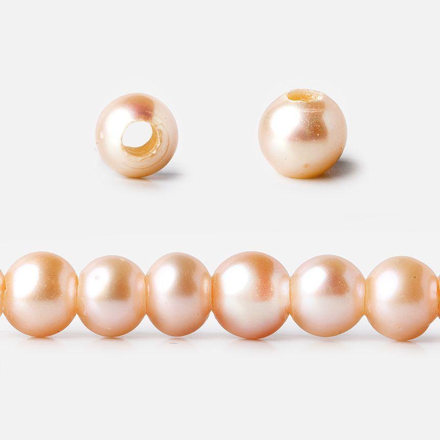 6 - 7mm Creamsicle Orange Large Hole Off Round Pearls 15 inch 75 beads - The Bead Traders