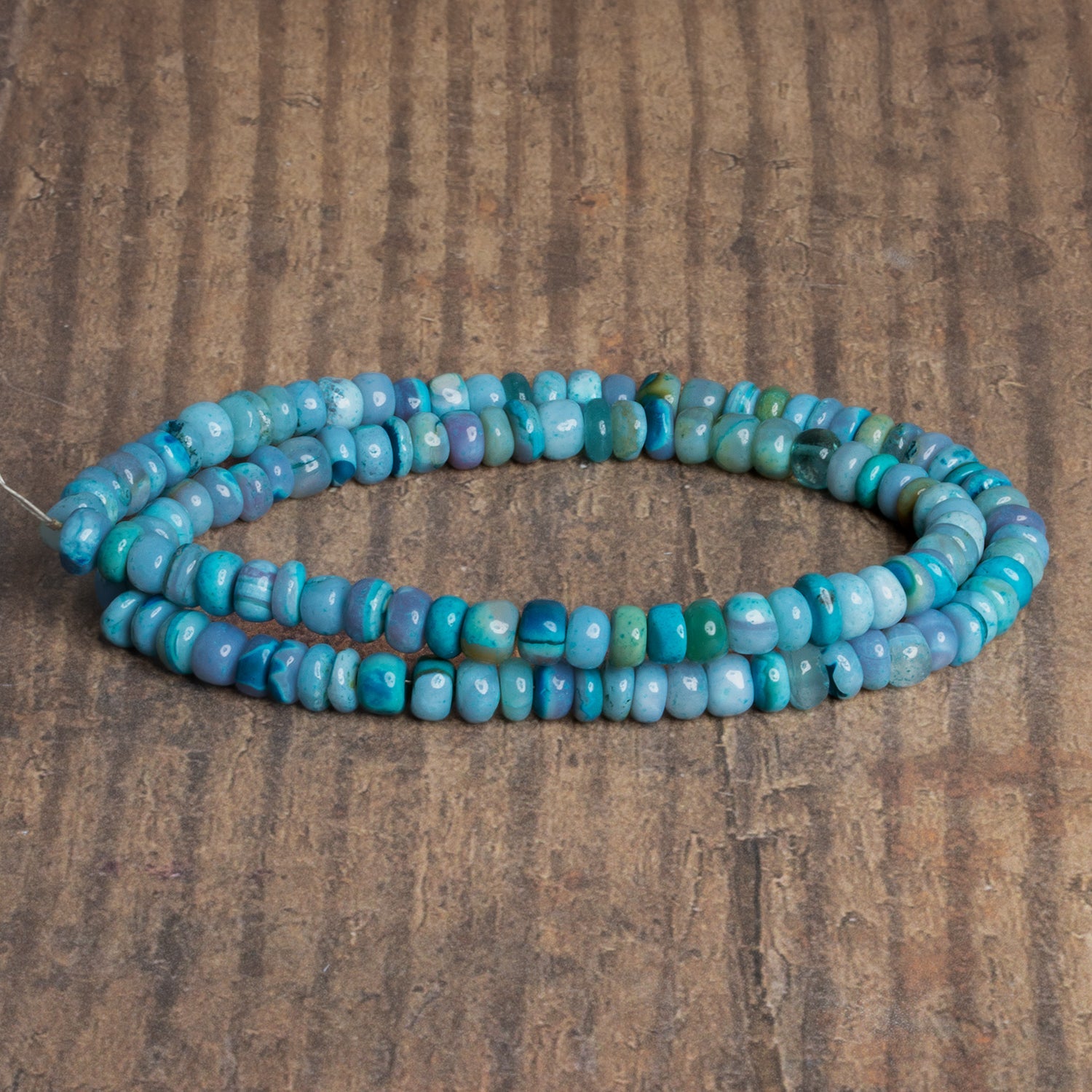 6-7mm Multi Blue Opal Plain Rondelles 16 inch 105 beads - The Bead Traders