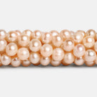 6 - 7mm Peach Off Round Pearls 15 inch 65 beads - The Bead Traders