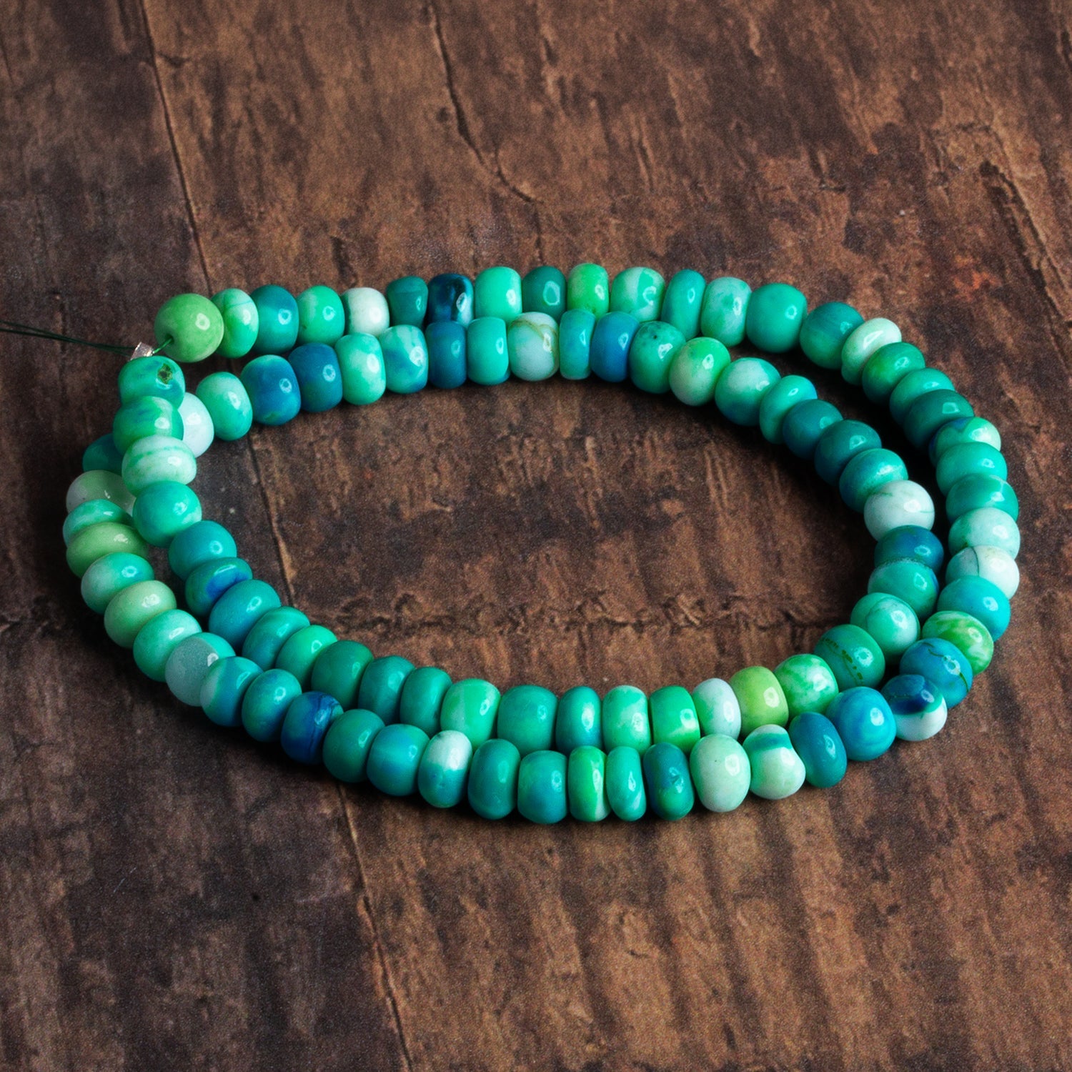 6 - 7mm Teal Opal Plain Rondelles 16 inch 90 beads - The Bead Traders