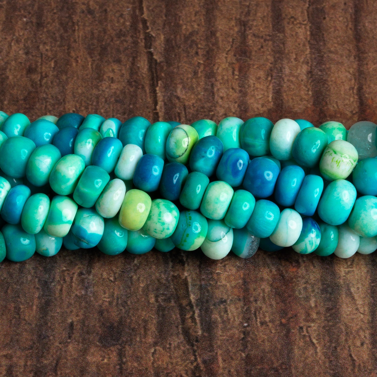 6 - 7mm Teal Opal Plain Rondelles 16 inch 90 beads - The Bead Traders