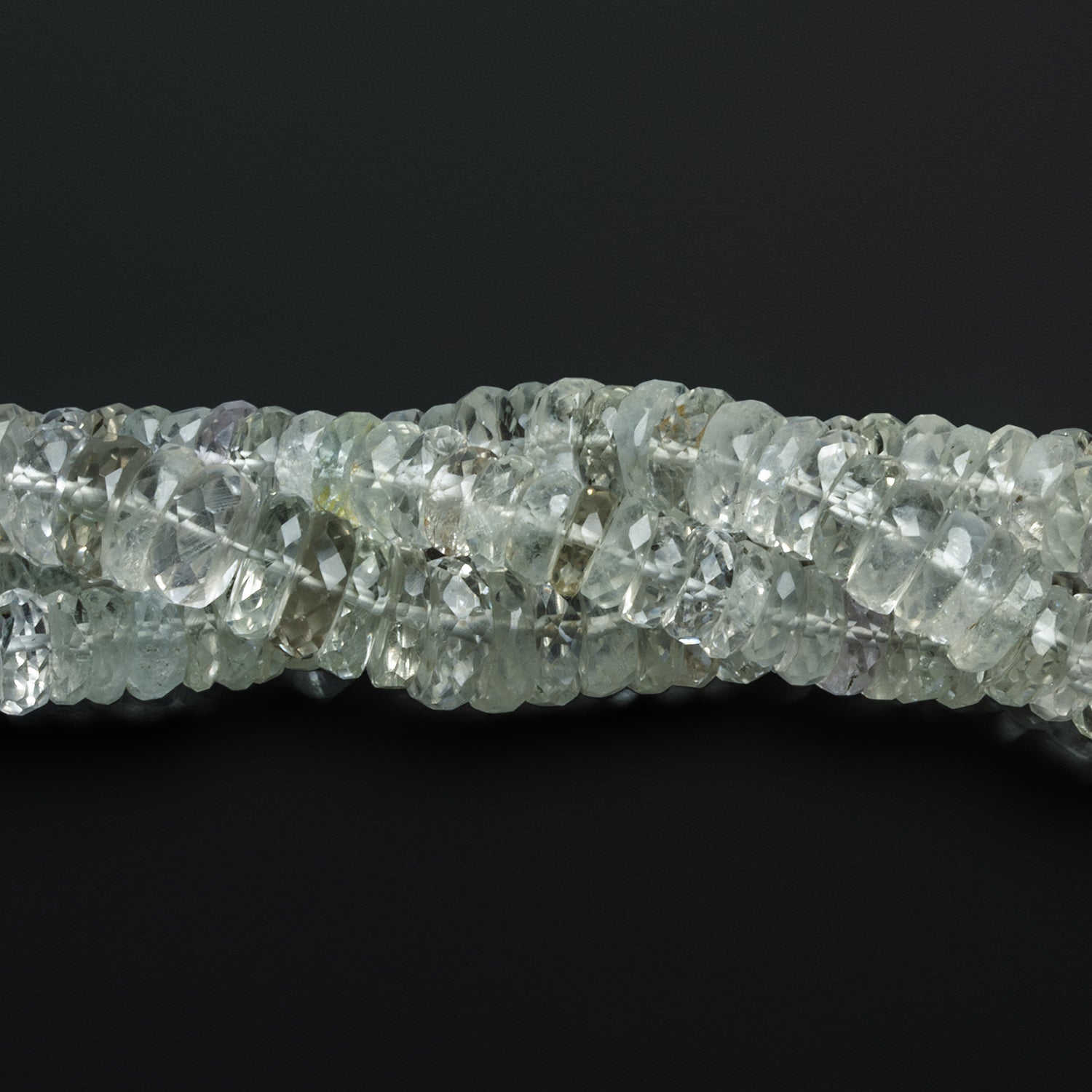 6 - 8.5mm Aquamarine Faceted Heishis 8 inch 75 beads - The Bead Traders