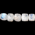 6.5 - 10mm Rainbow Moonstone faceted cubes 16 inch 49 beads - The Bead Traders