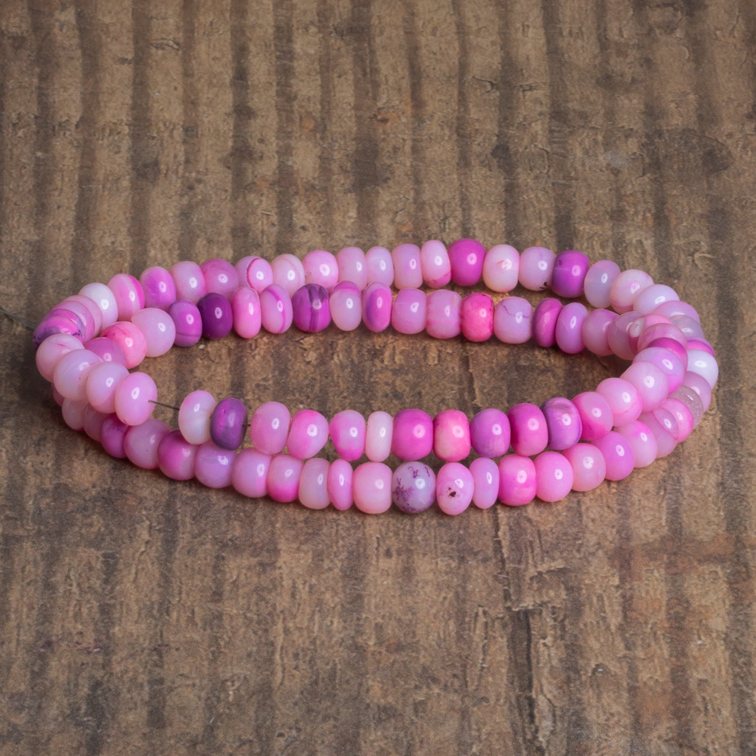 6.5mm Princess Pink Opal Plain Rondelles 16 inch 90 beads - The Bead Traders