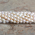 6.5x5mm Cream Petite Baroque Pearls 15 inch 56 beads - The Bead Traders