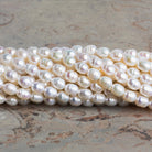 6.5x5mm Cream Petite Ringed Baroque Pearls 15 inch 58 beads - The Bead Traders