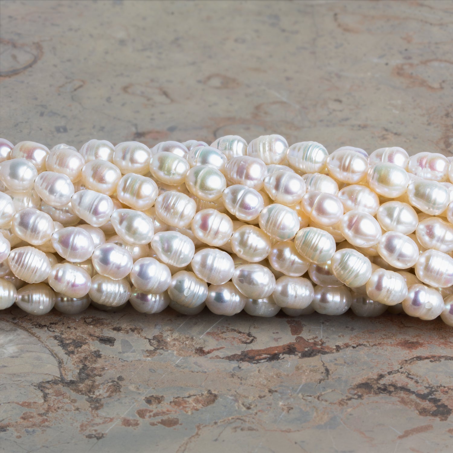 6.5x5mm Cream Petite Ringed Baroque Pearls 15 inch 58 beads - The Bead Traders