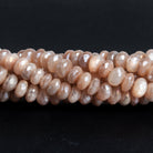 6mm Mystic Peach Moonstone Faceted Rondelles 7.5 inch 45 beads - The Bead Traders