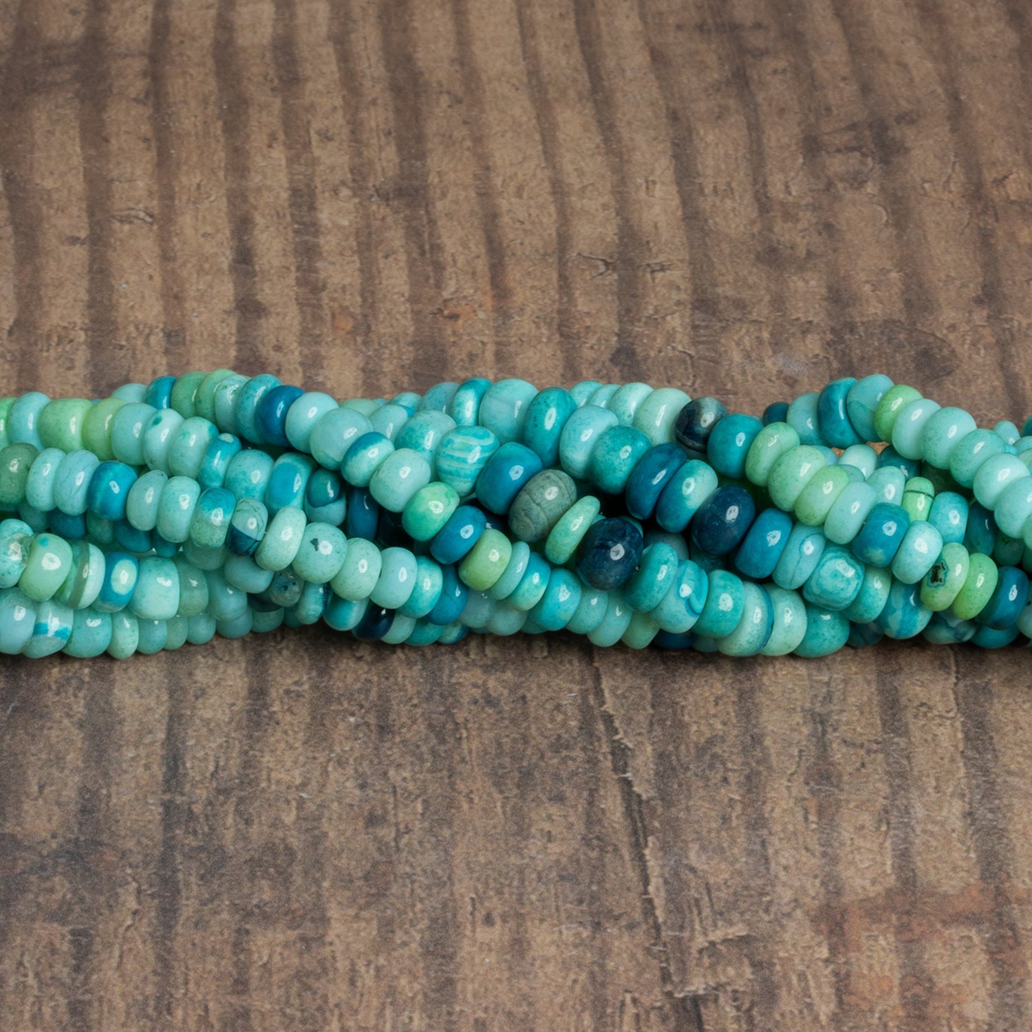 6mm Teal Opal Plain Rondelles 16 inch 105 beads - The Bead Traders