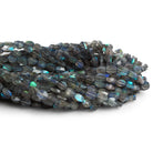 6x4.5mm Labradorite Faceted Ovals 12 inch 51 beads - The Bead Traders