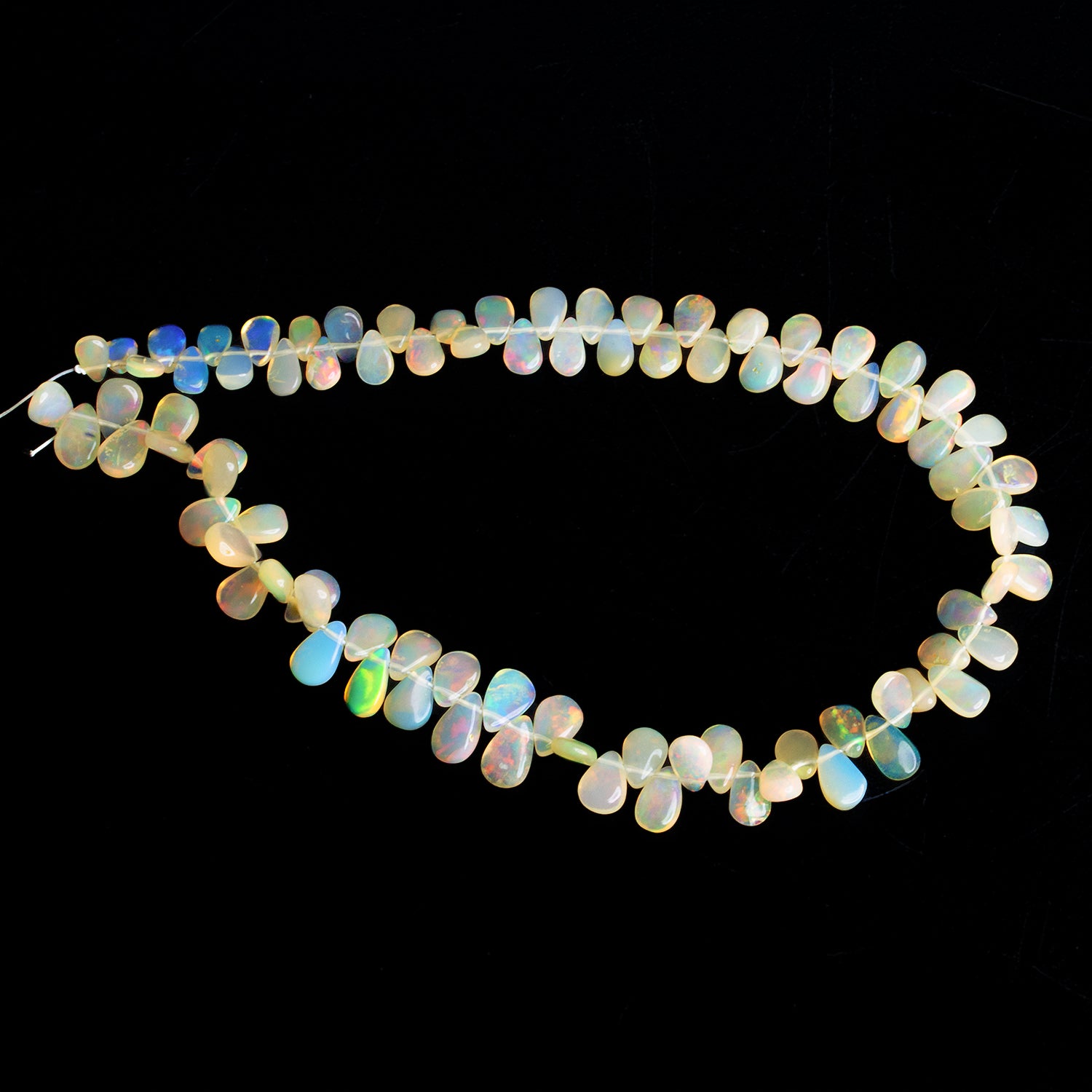 6x4mm Ethiopian Opal Plain Pears 9 inch 75 beads - The Bead Traders