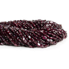 6x4mm Garnet Faceted Ovals 12 inch 55 beads - The Bead Traders