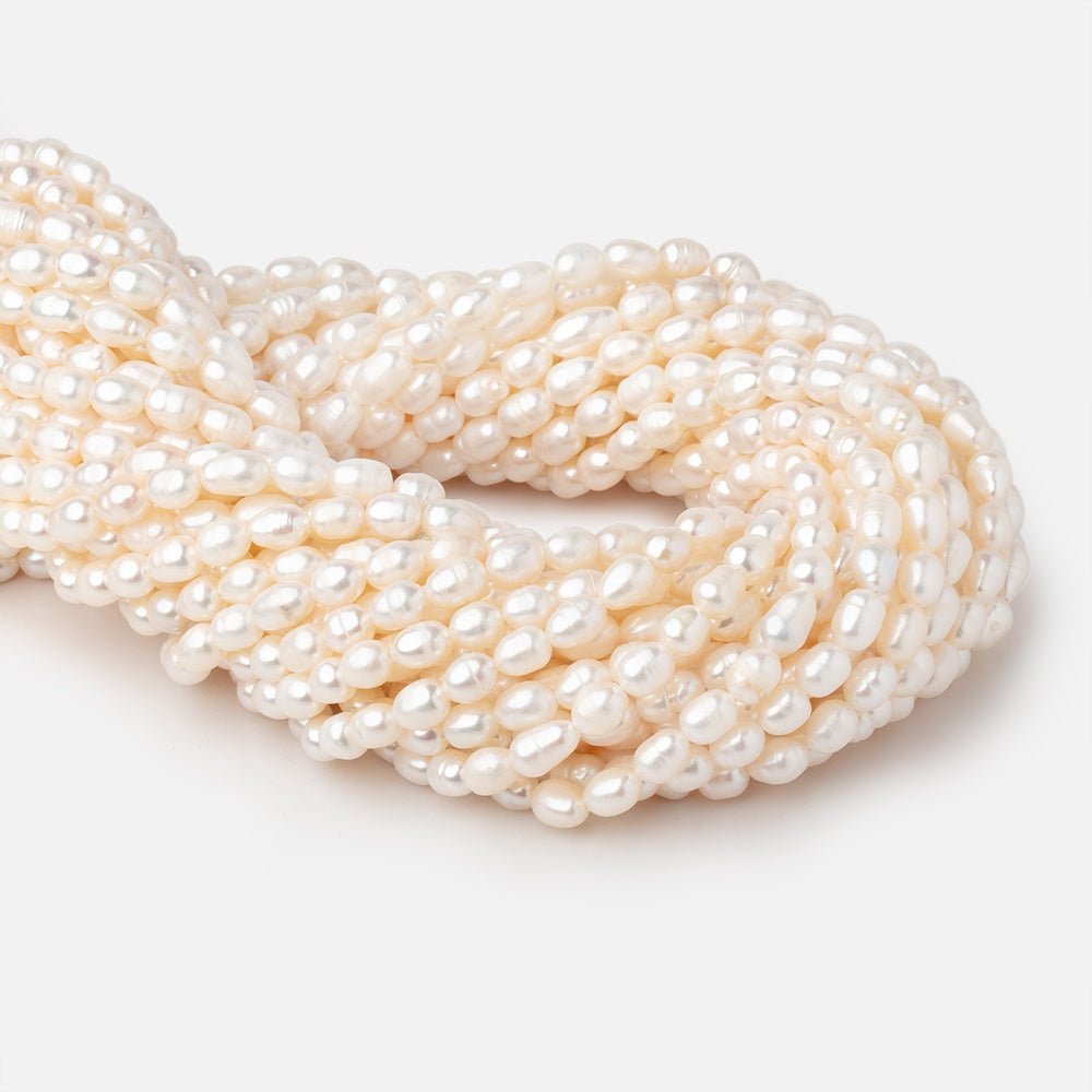 6x4mm Off White Ringed Oval Pearls 15 inch 58 beads - The Bead Traders
