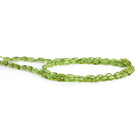 6x4mm Peridot Plain Rice 14 inch 65 beads - The Bead Traders