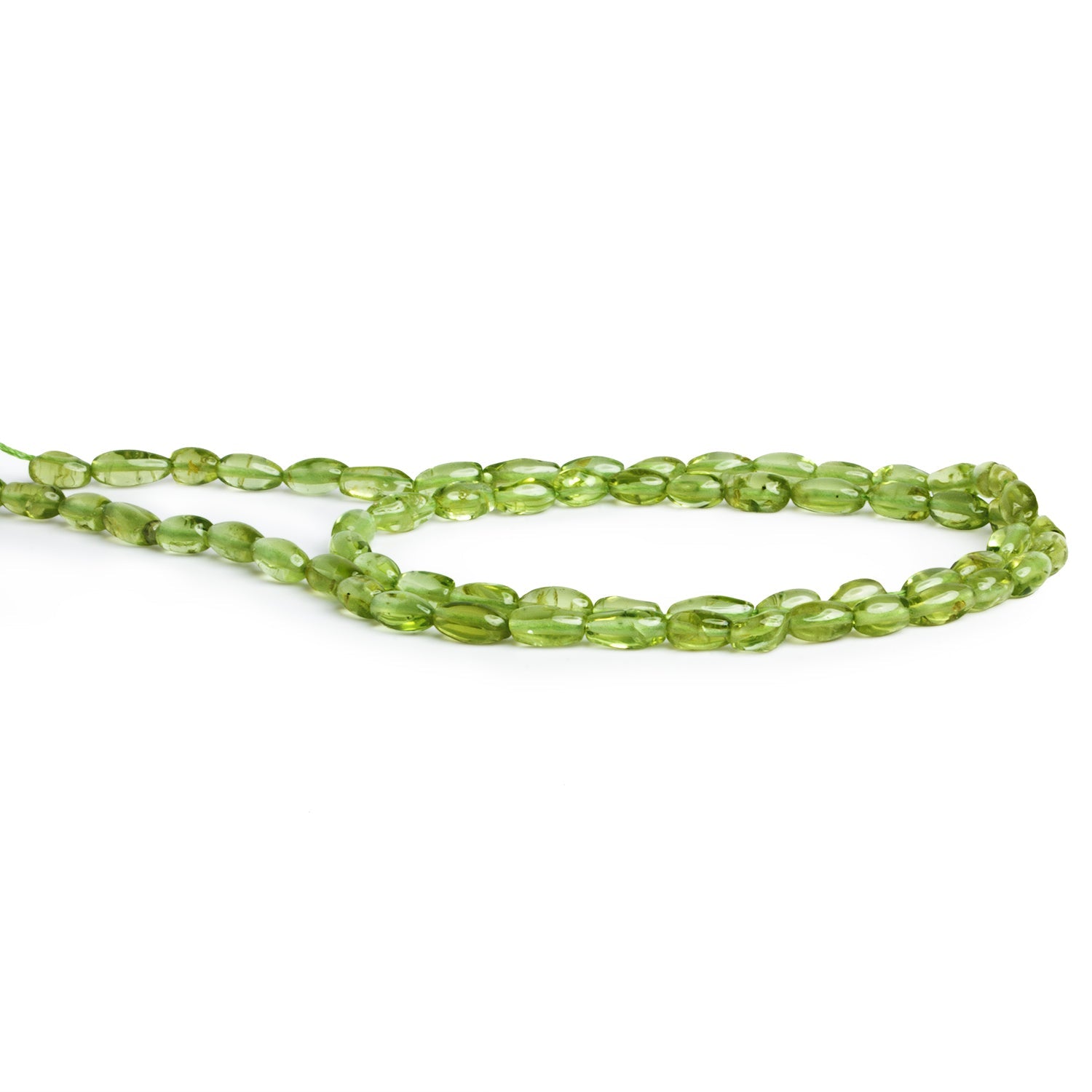 6x4mm Peridot Plain Rice 14 inch 65 beads - The Bead Traders