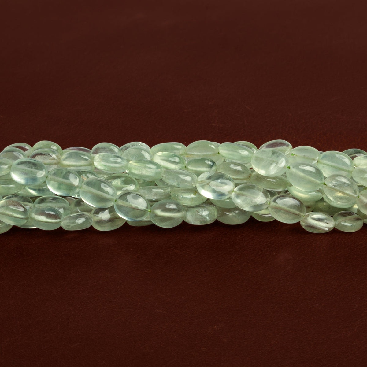 6x4mm Prehnite Plain Ovals 18 inch 80 beads AA Grade - The Bead Traders