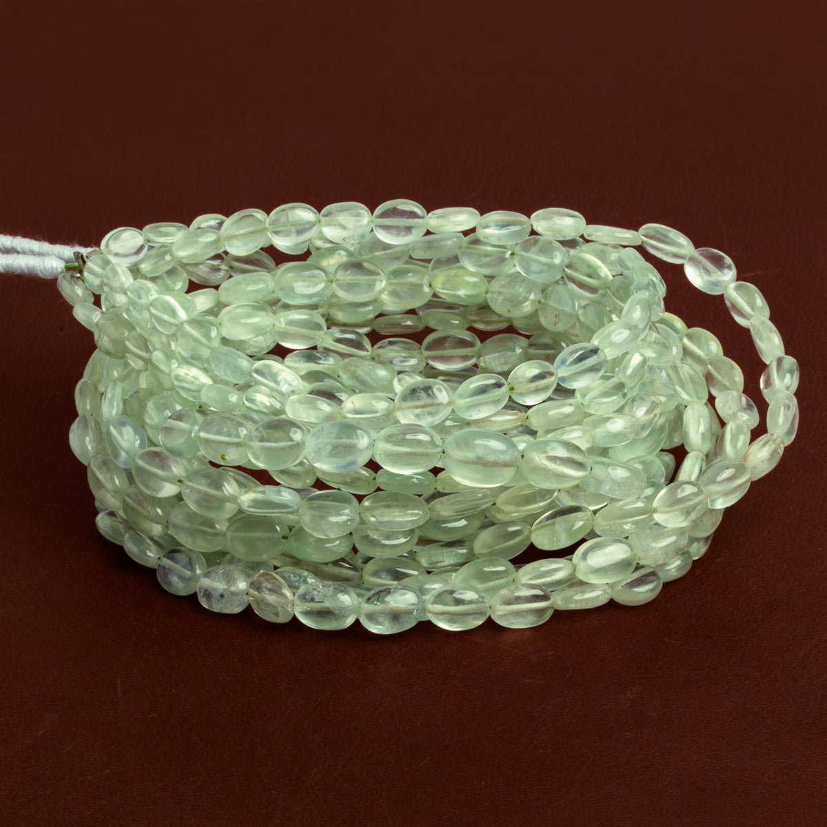 6x4mm Prehnite Plain Ovals 18 inch 80 beads AA Grade - The Bead Traders