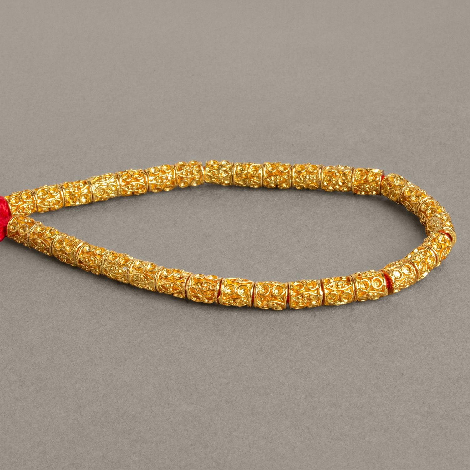 6x5mm 22kt Gold Plated Copper Decorated Tubes 8 inch 32 beads - The Bead Traders