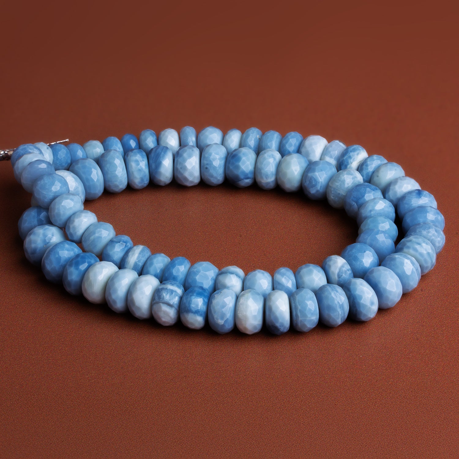 7 - 11mm Denim Opal Faceted Rondelles 16 inch 73 beads - The Bead Traders