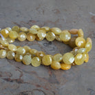 7 - 11mm Yellow Sapphire Faceted Coins 8 inch 21 beads - The Bead Traders