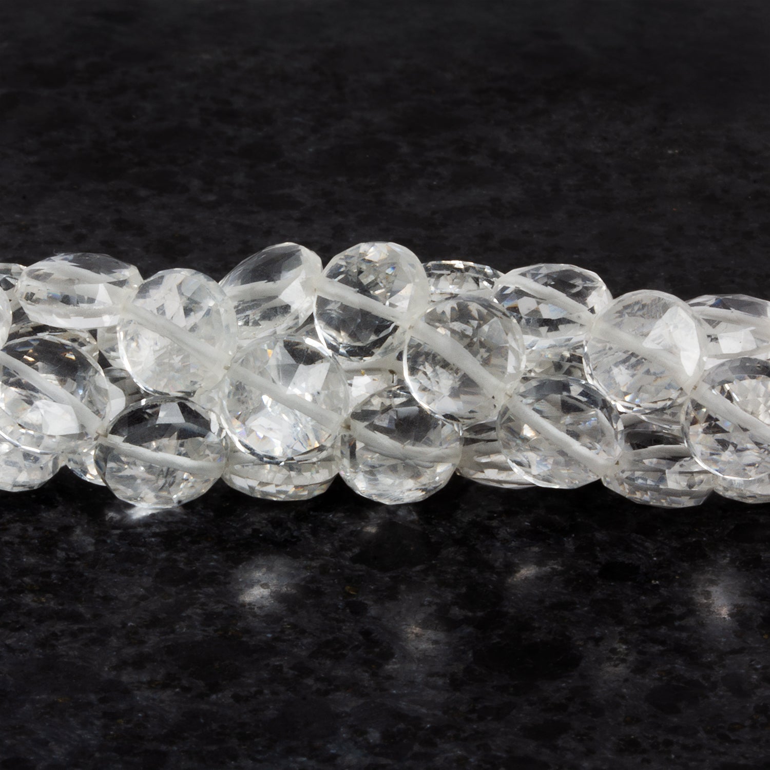 7 - 14mm Crystal Quartz Faceted Coins 8 inch 21 beads - The Bead Traders