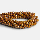 7-7.5mm Bronze Off Round Freshwater Pearls 15 inch 58 beads - The Bead Traders