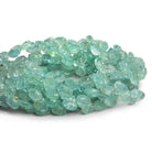 7 - 8mm Aquamarine Carved Hearts 8 inch 39 beads - The Bead Traders