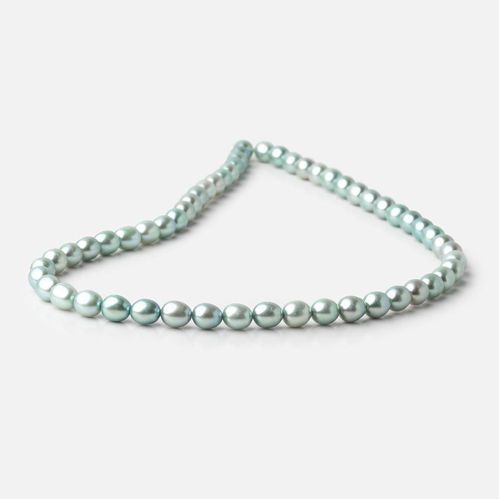 7 - 8mm Mint Green Oval Pearls 16 inch 55 beads - The Bead Traders