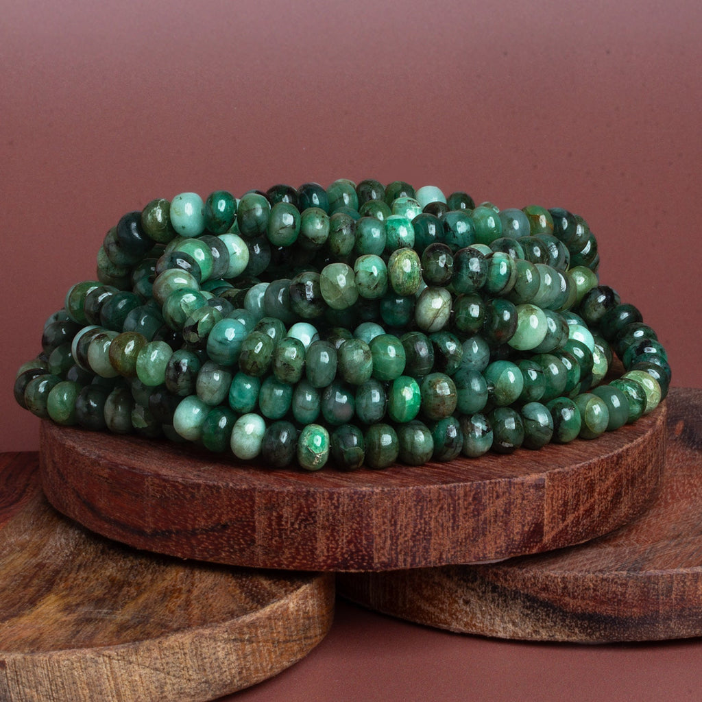 7mm Emerald Plain Rondelles 16 inch 75 beads - The Bead Traders